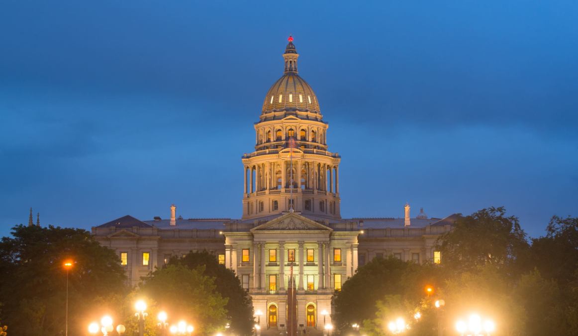 A photo of the Colorado State Capitol at night